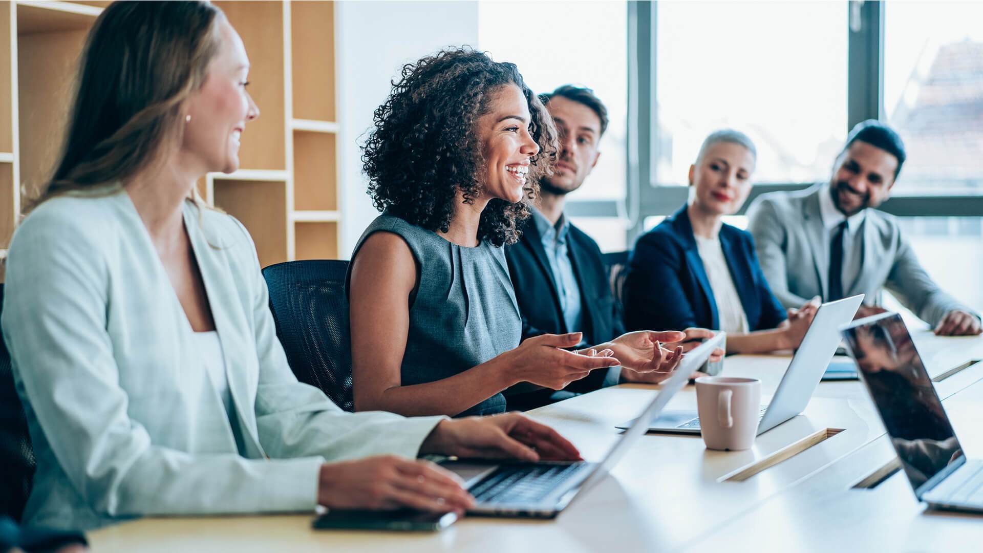 Group of business persons in business meeting. Group of entrepreneurs on meeting in board room. Corporate business team on meeting in the office.